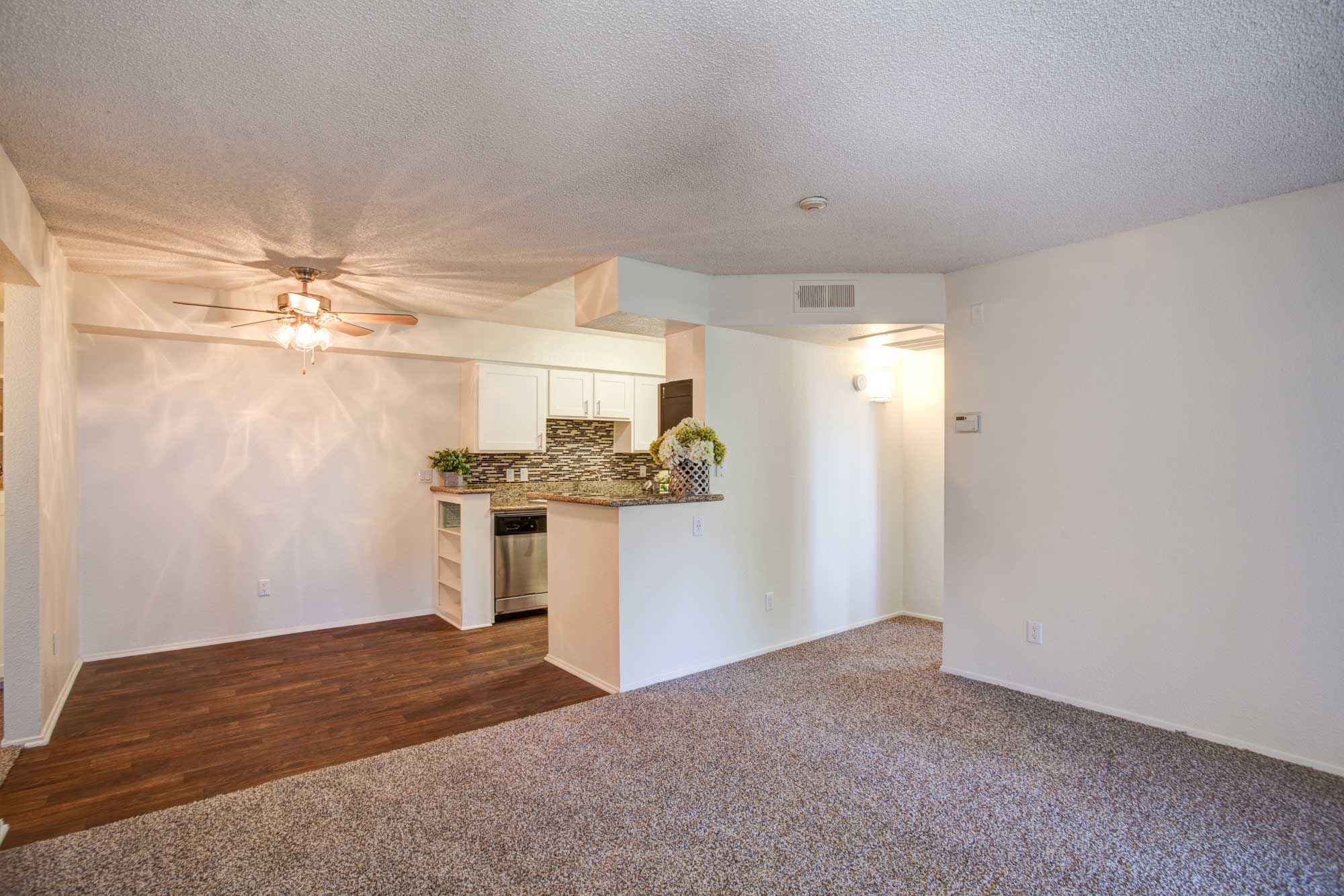 livingroom into kitchen area and hallway at Waterstone