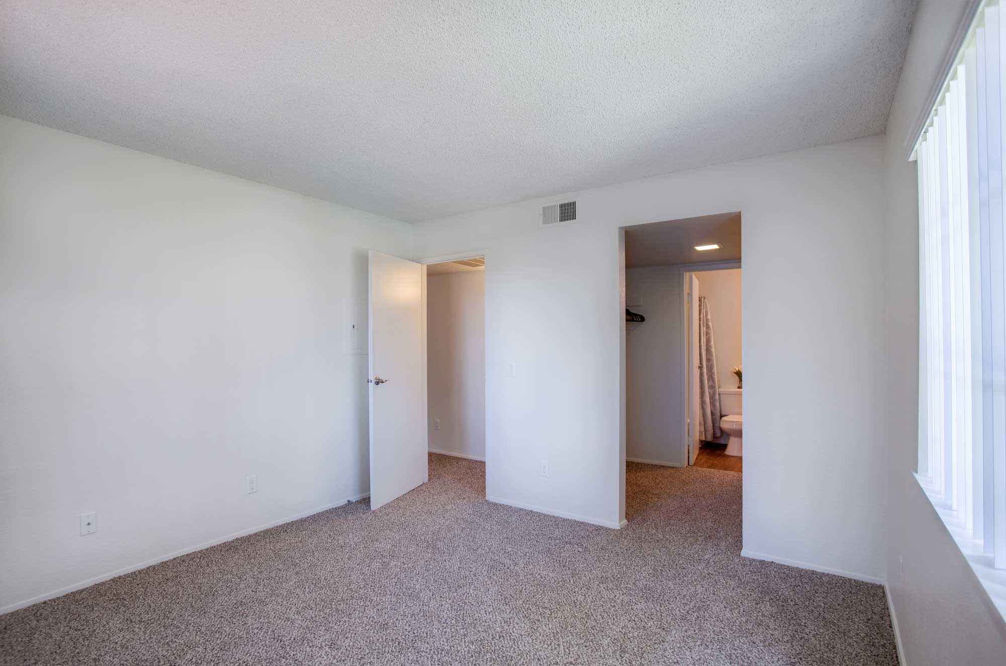 bedroom walkin closet to bathroom at Waterstone