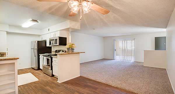 Waterstone Alta Loma Apartment living room, dining area, and kitchen